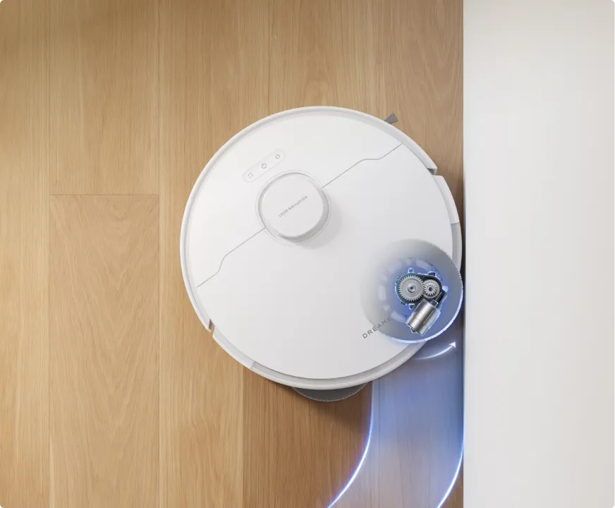 Robotas valo palei sieną kampe