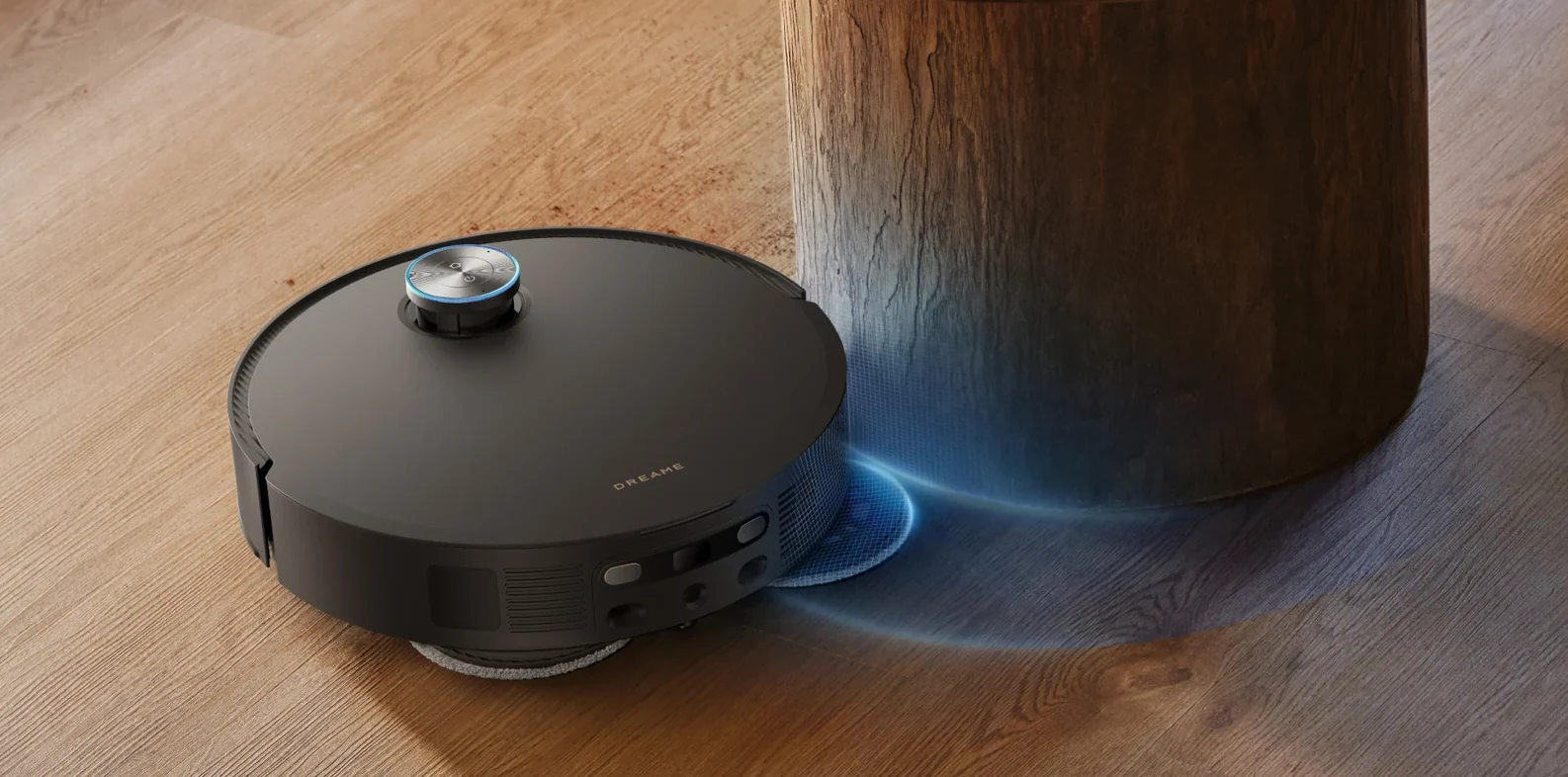Robotas apvažiuoja apvalaus stalo koją