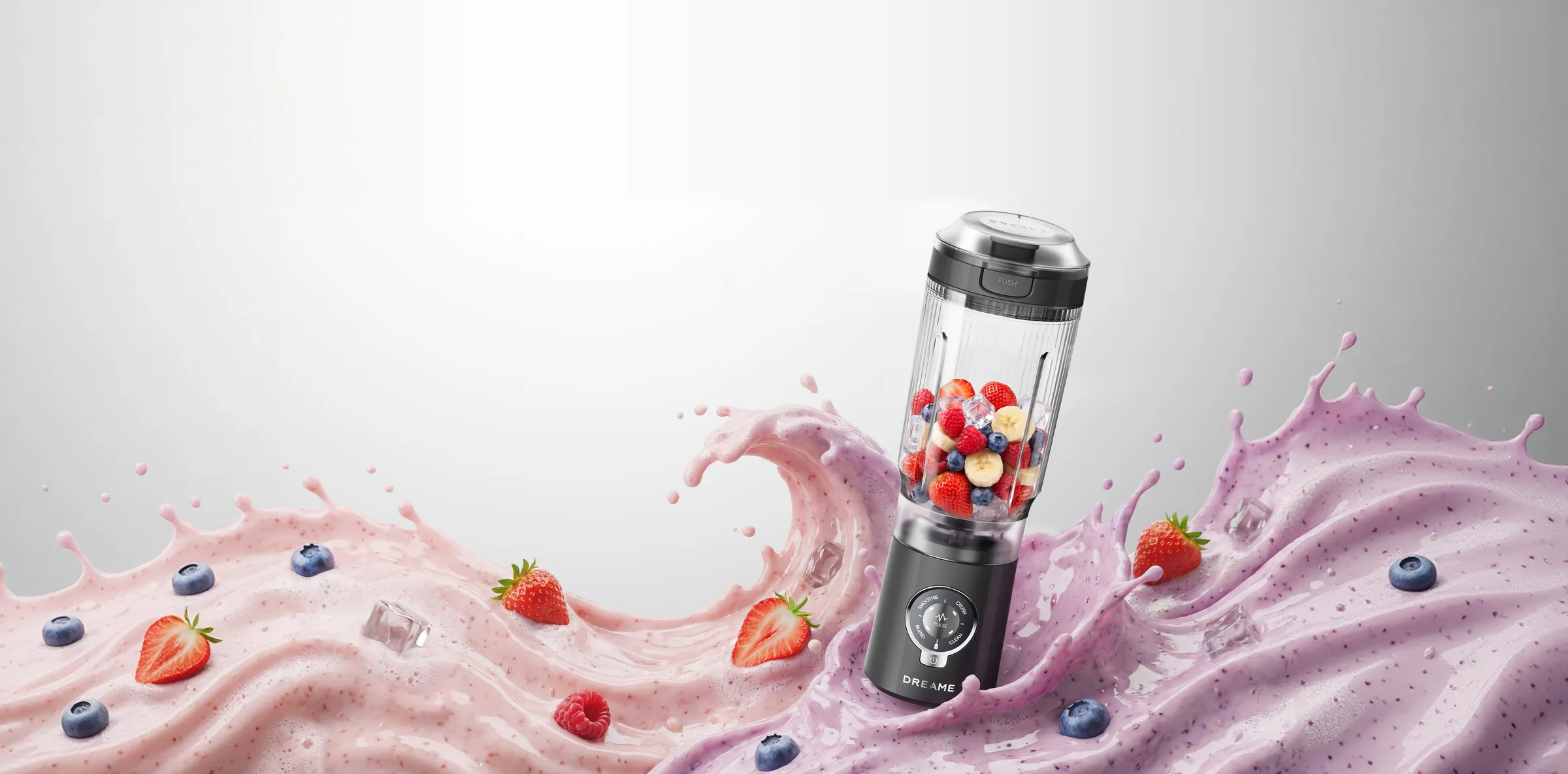DREAME PortFresh™ PB10 nešiojamas trintuvas su uogomis rožinio ir violetinio kokteilio purslų fone